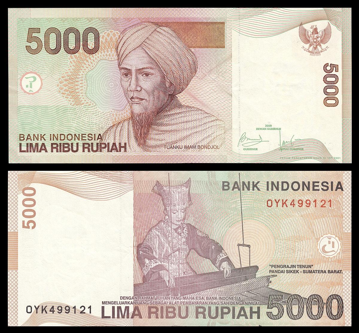Uang kertas rupiah lima ribu sebagai simbol transaksi di Indonesia